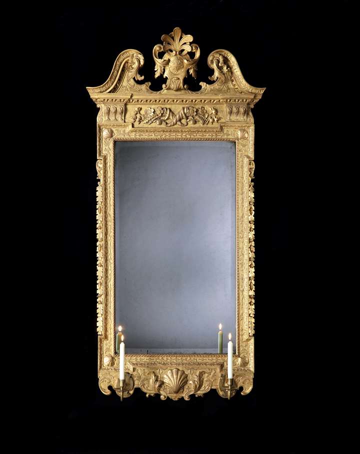 A Rare George II Carved Giltwood Mirror